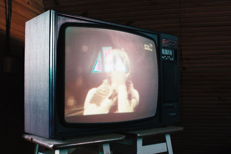 Picture of an old TV. Digging out some old TV shows from youtube can be a great way to reminisce with your loved one.