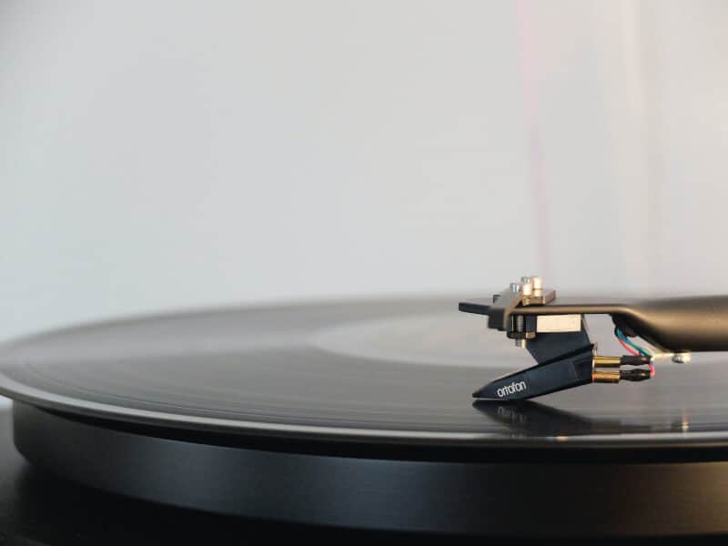 A vinyl record being held up to the light
