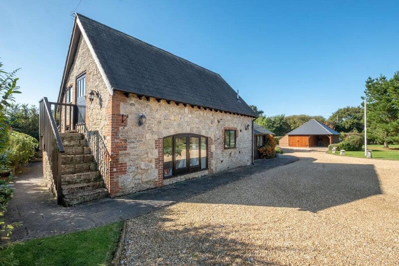 A self-contained stone cottage annexe in the grounds of a four-bedroom farmhouse on the Isle of Wight