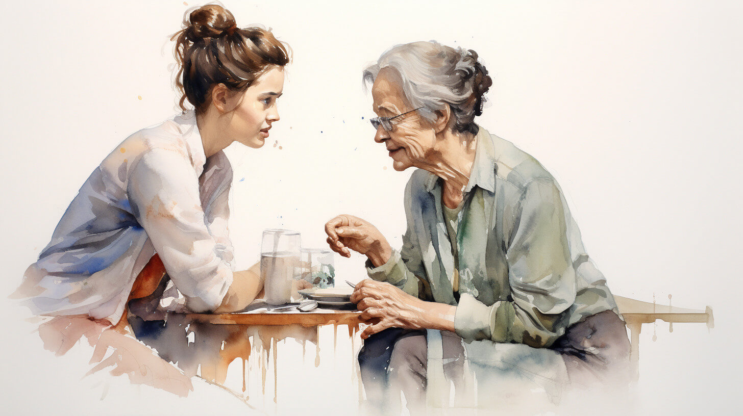 A younger woman leaning in close and talking with an older woman across a table